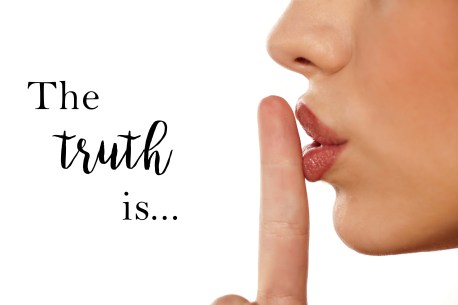 finger on her lips. silence gesture